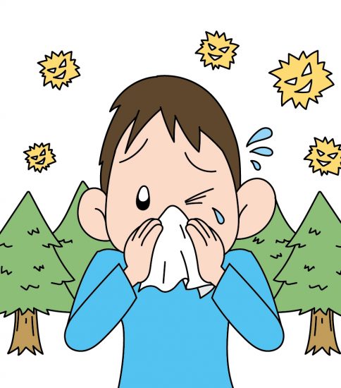 花粉症で鼻水が止まらない男性